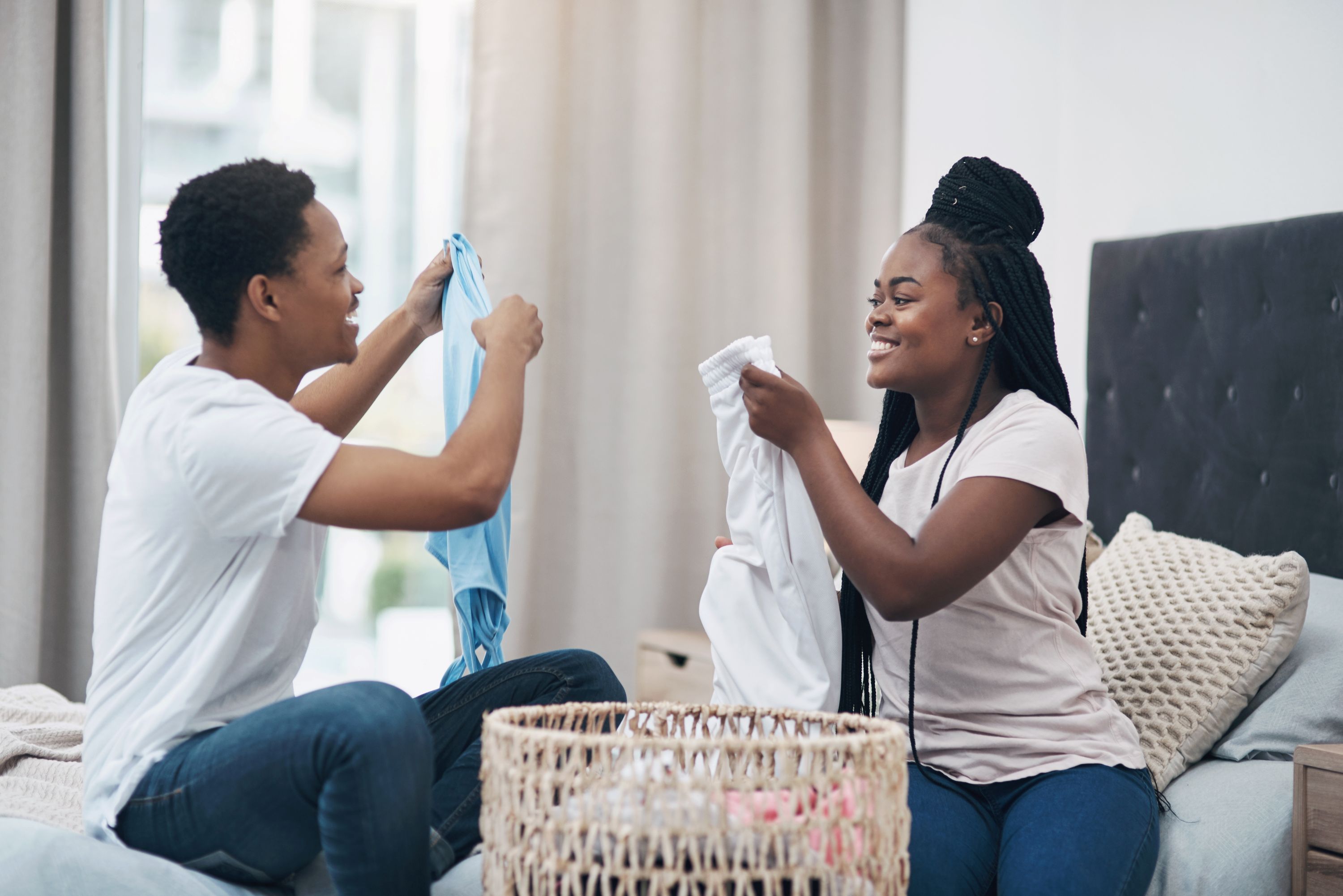 Couple Doing Laundry Shutterstock 2138299865